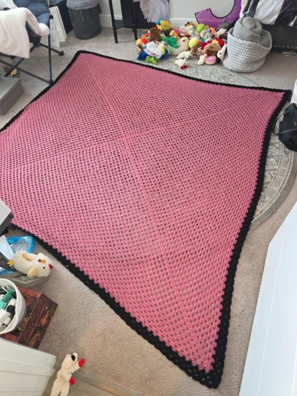 Handmade crochet blanket, pink with black border, granny square pattern